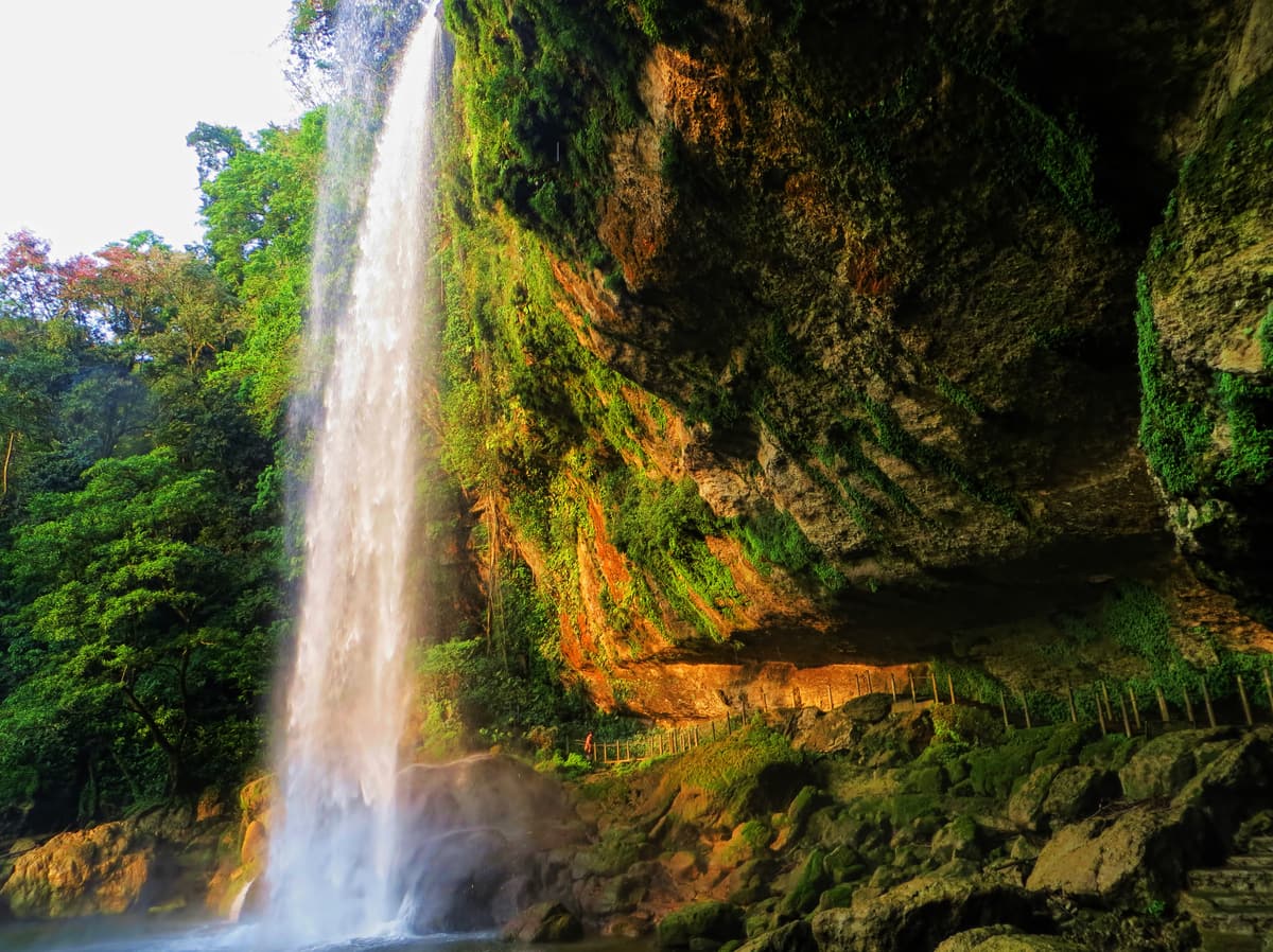The Misol-Ha waterfall dropping into its jungle pool